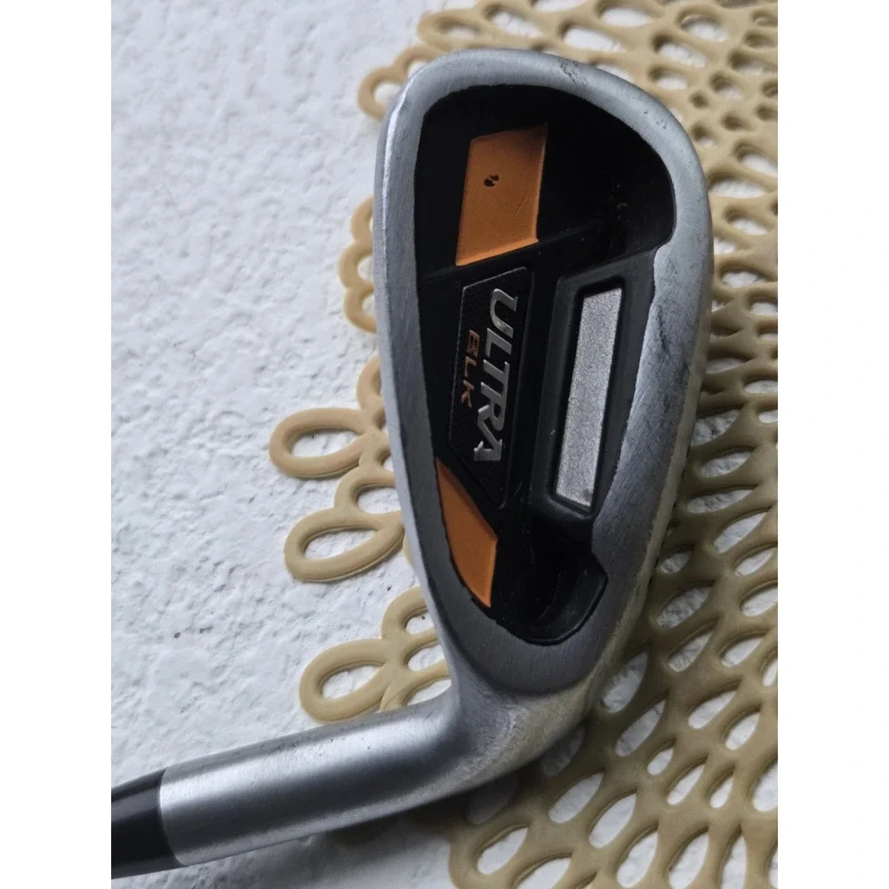 Wilson Ultra BLK iron, recognizable by the orange cavity.pitching Wedge 35.25